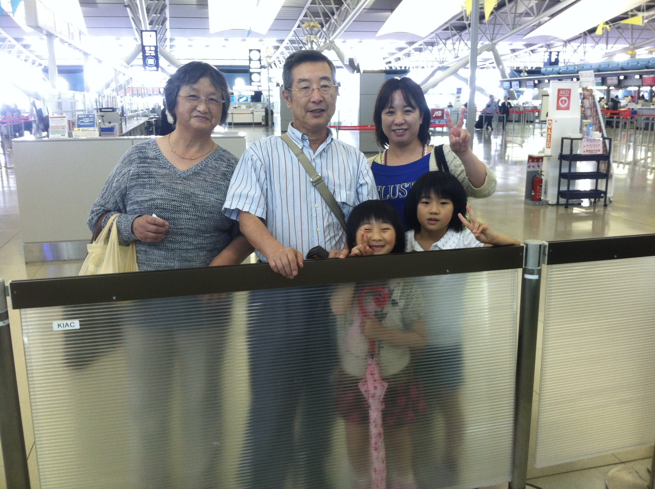 Host family saying goodbye at airport
