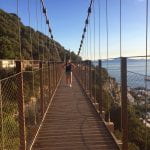 Author standing on a suspension bridge