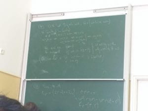 Chalkboard with abstract algebra problems