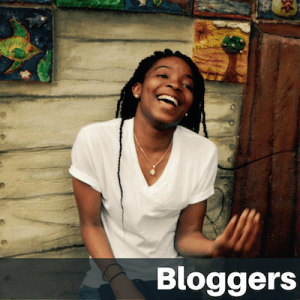Text on image "Bloggers": Cheerful female student talking animatedly