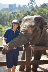 Kyra with elephant in Thailand