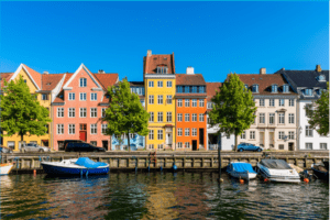 Brightly colored buildings along a canal