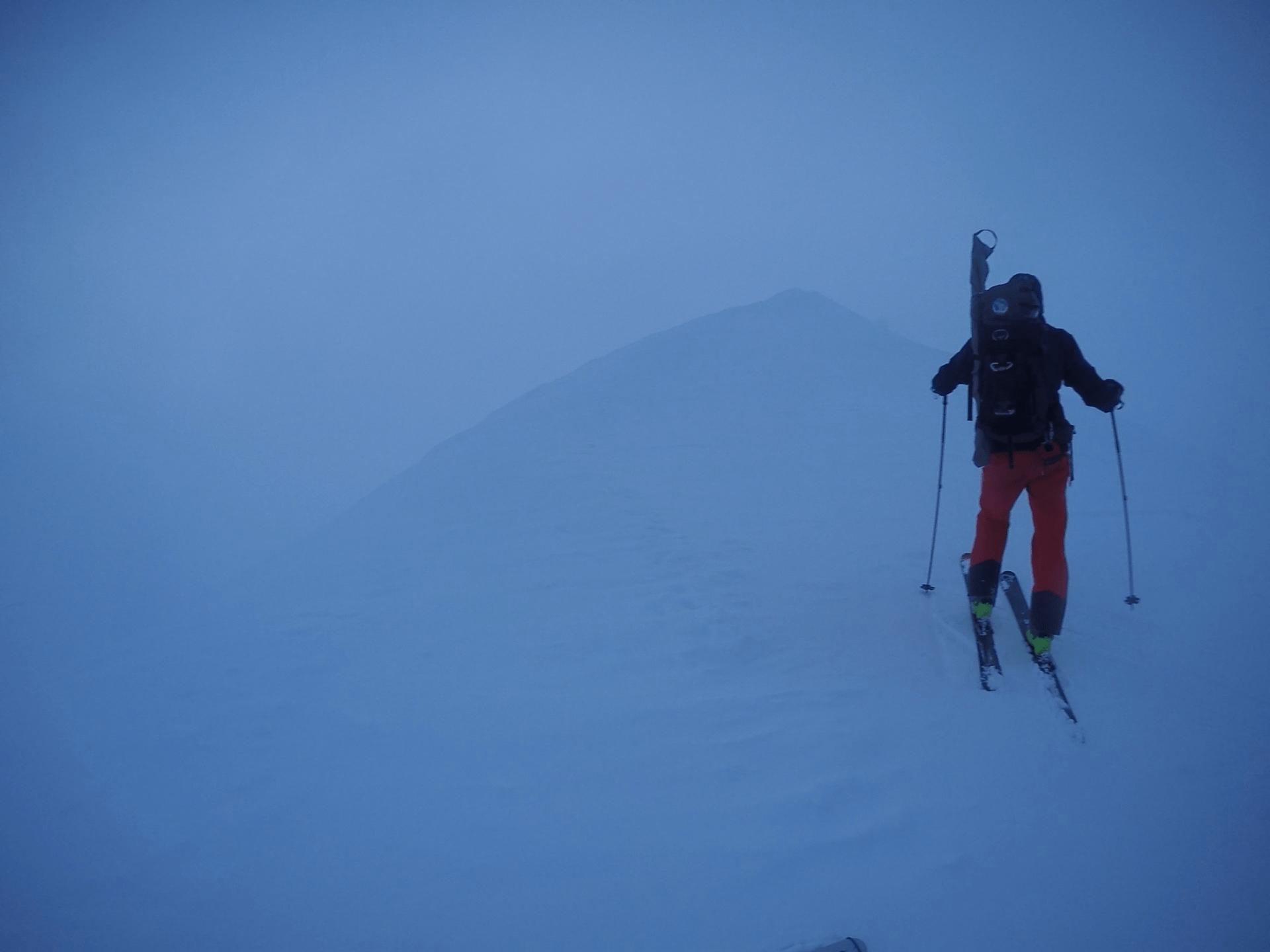 Person skiing in low-lighting