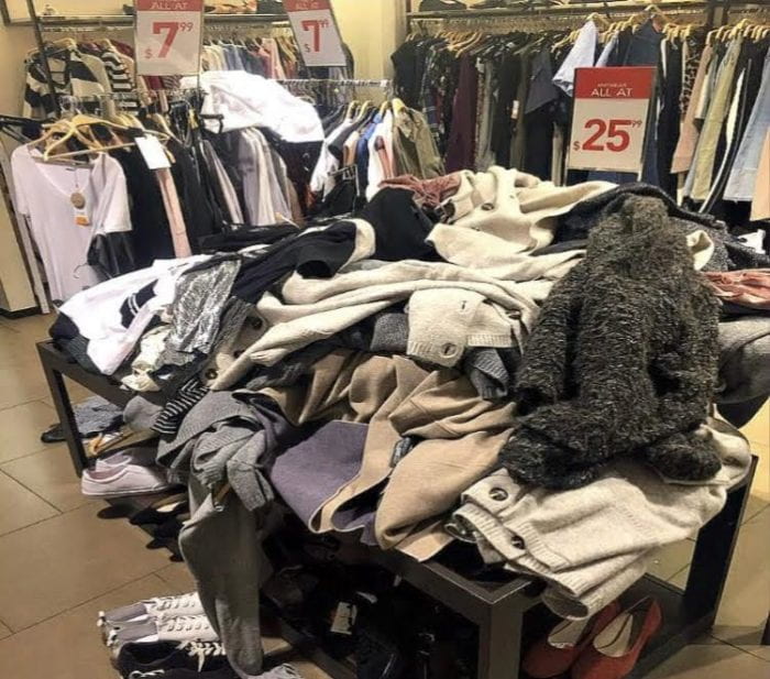 A pile of clothes at a European mall.