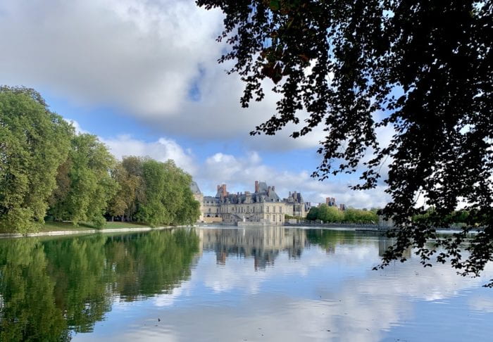 View of Chateau Fontainebleau from a lake