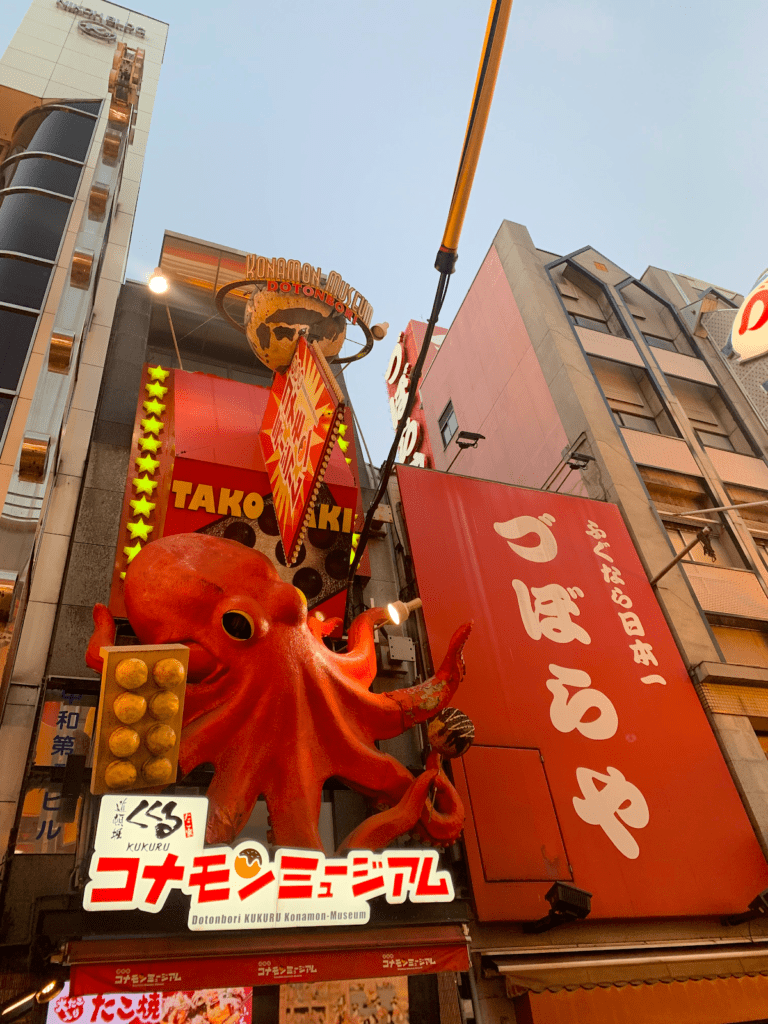 A large red octopus on the signage for a restaurant 